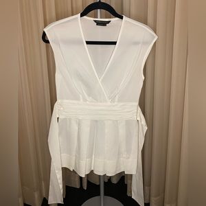 BCBG Blouse V Neck. White. Size small.